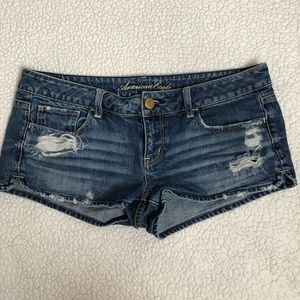 Distressed light wash denim shorts